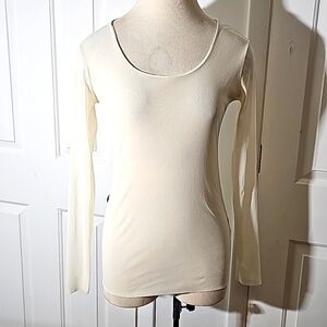 D. EXTERIOR women's fitter stretch top made in Italy. Cream color size large.